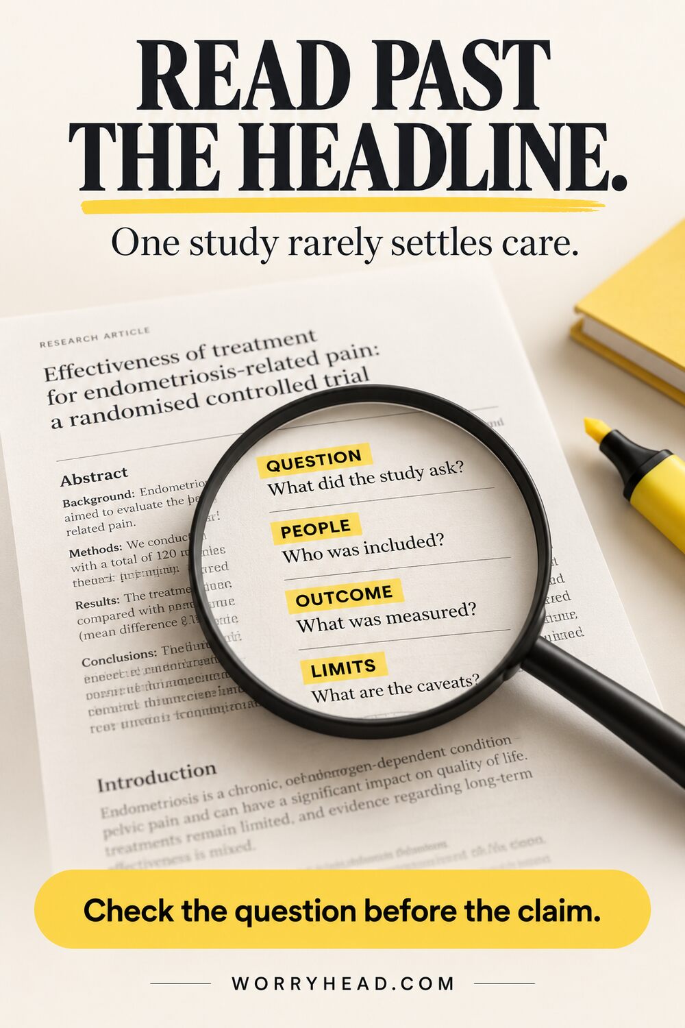 Magnifying glass over a paper showing how to read endometriosis research.